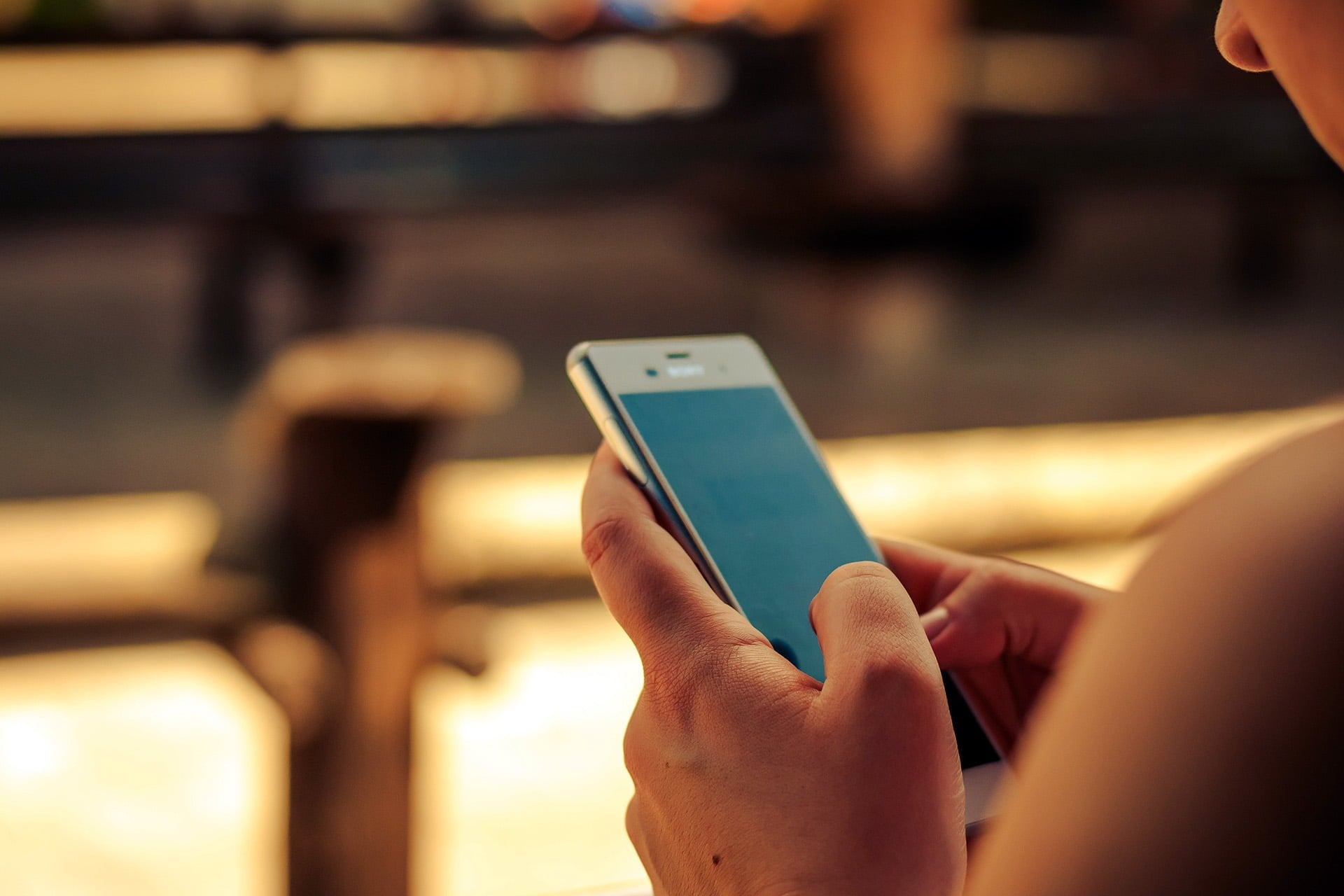 SmartPhone App person navigating smartphone